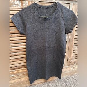 Lululemon Swiftly Tech Short-Sleeve Charcoal Gray Hip Length Top (Size 6)